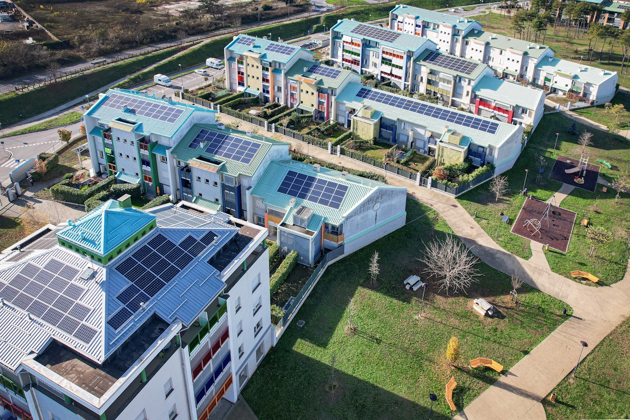 Modern Buildings With Solar Panels On The Roof Italy Shutterstock 2083613173